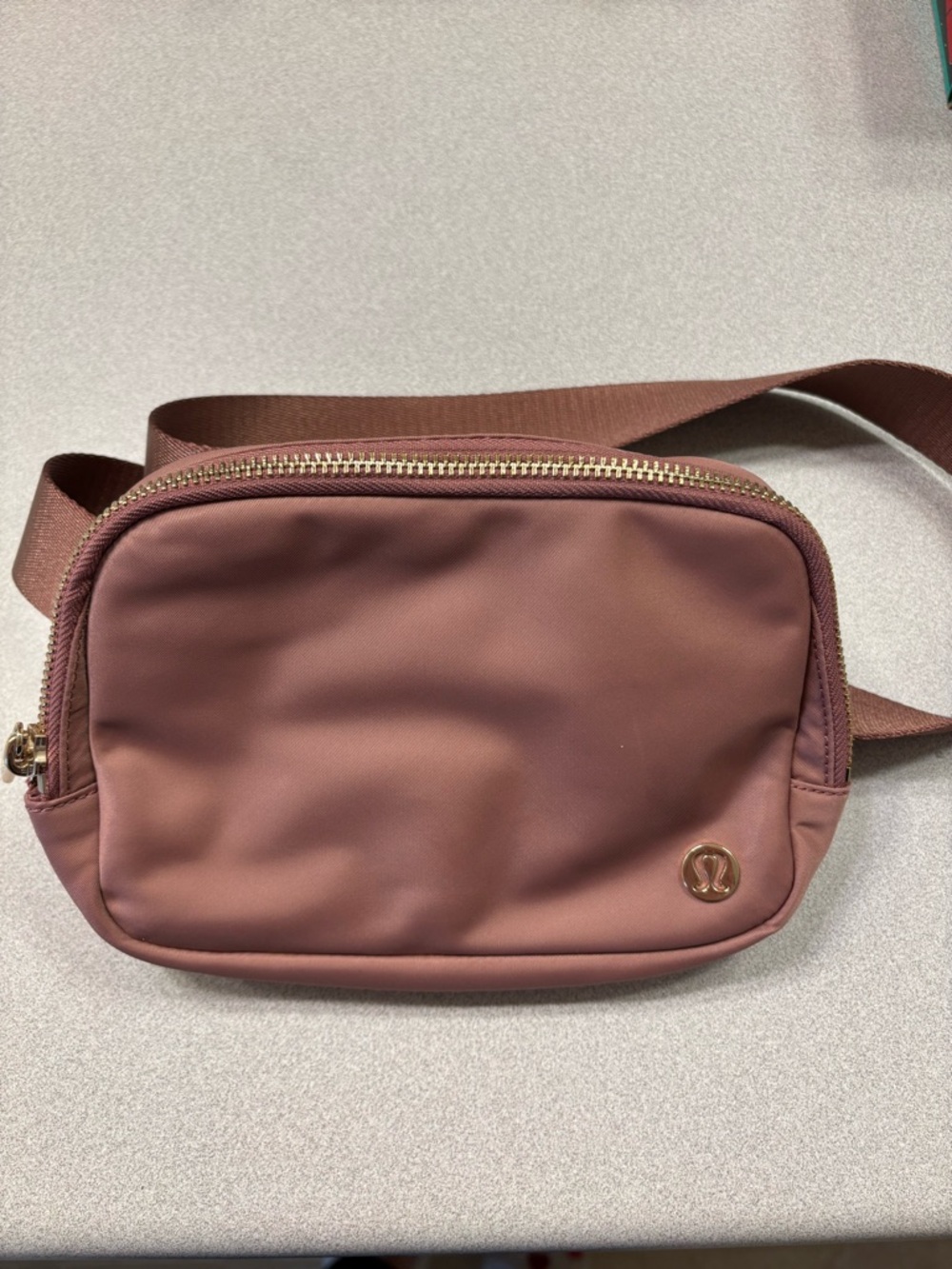 lululemon athletica Mauve/Brown Crossbody Pouch with Gold Logo